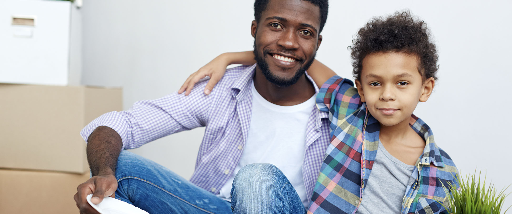 Father and son smiling